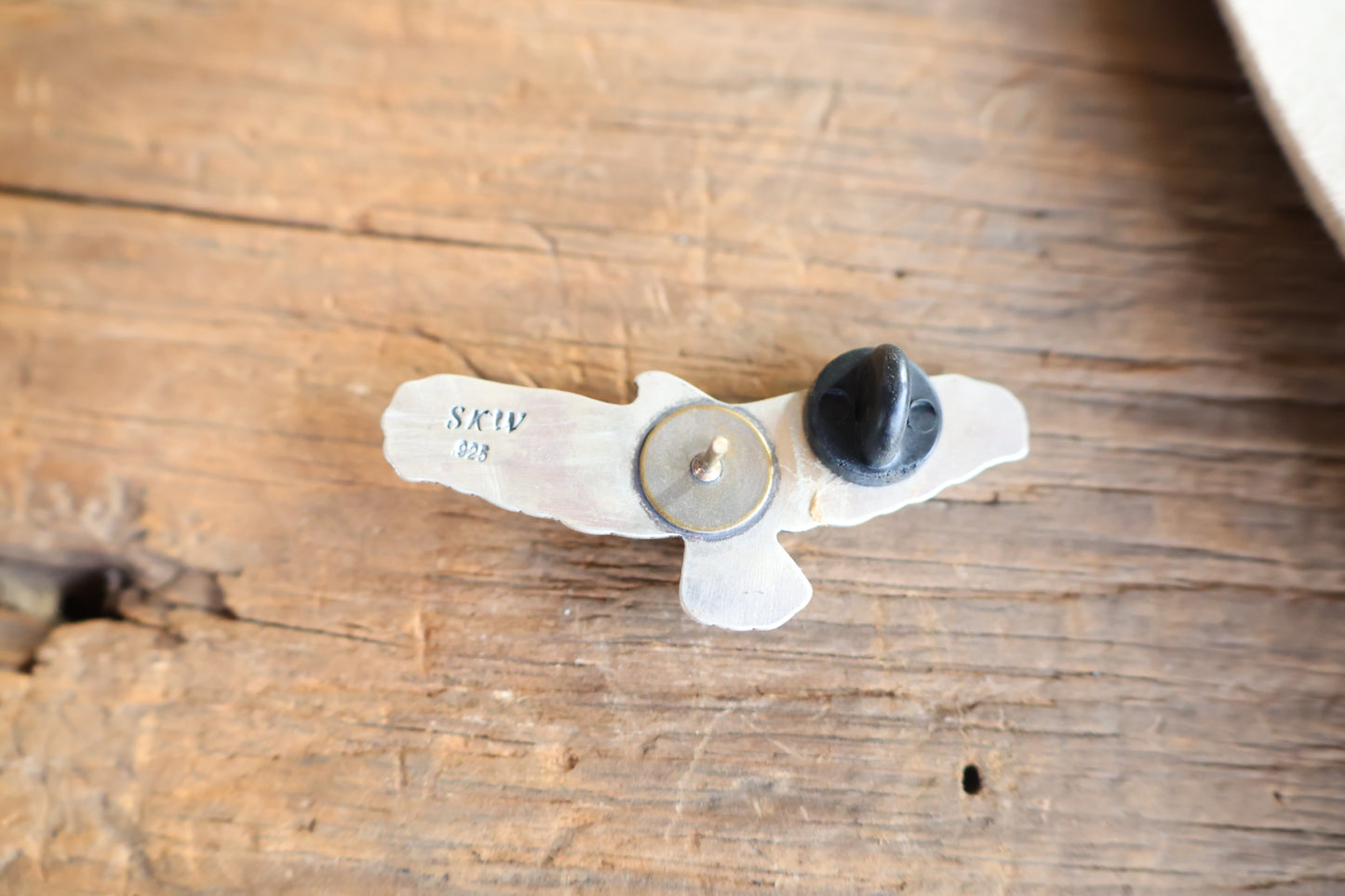 Hawk pin with Kingman turquoise