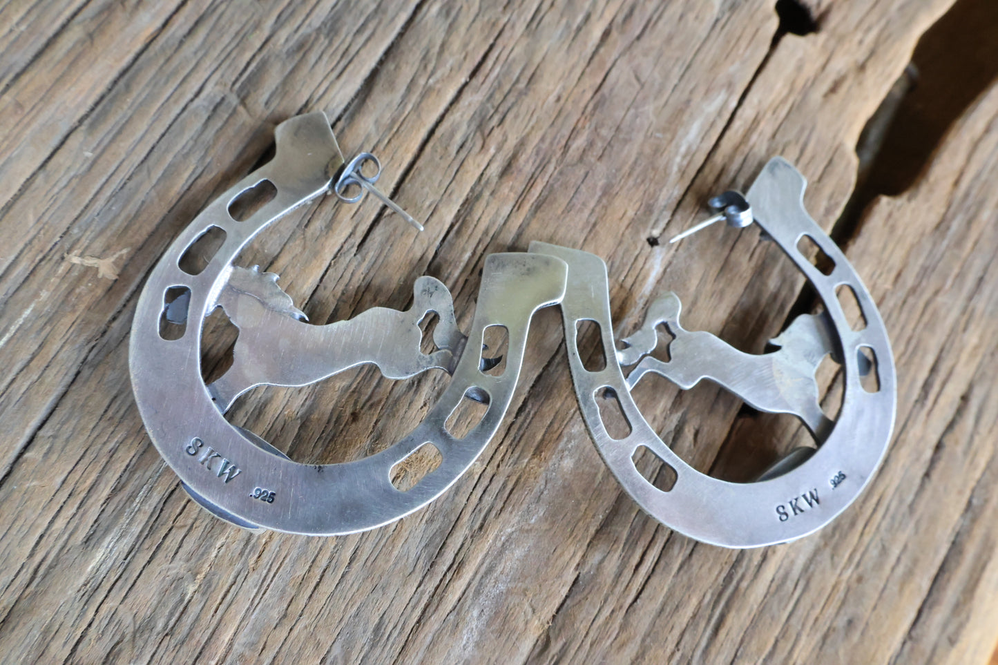 Horse shoe bucking bronco hoops