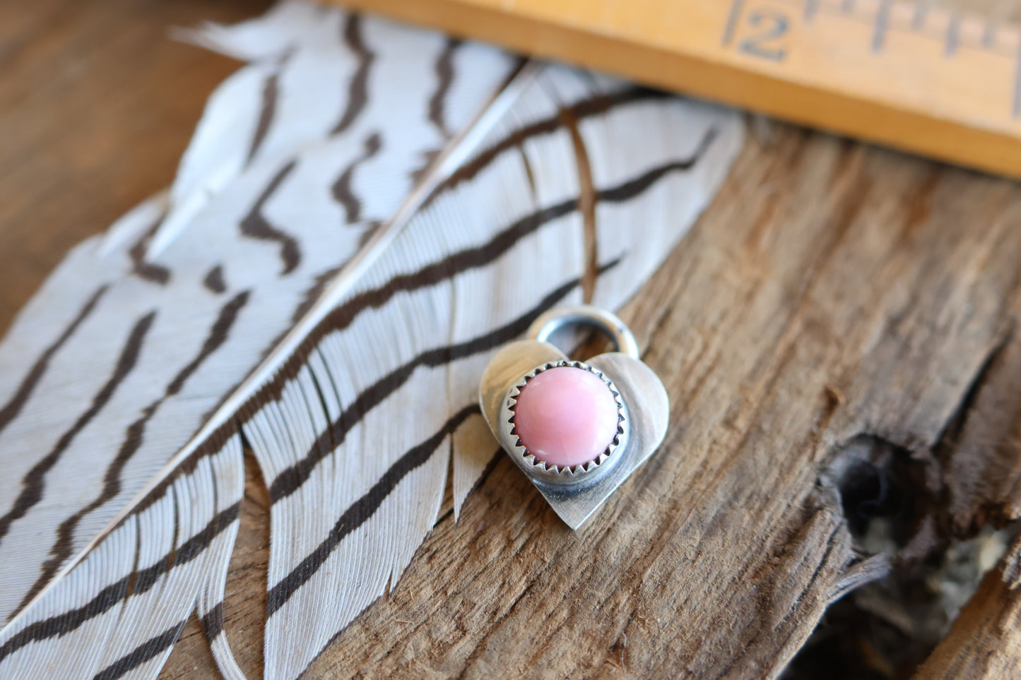 Heart charm with queen conch •sterling silver