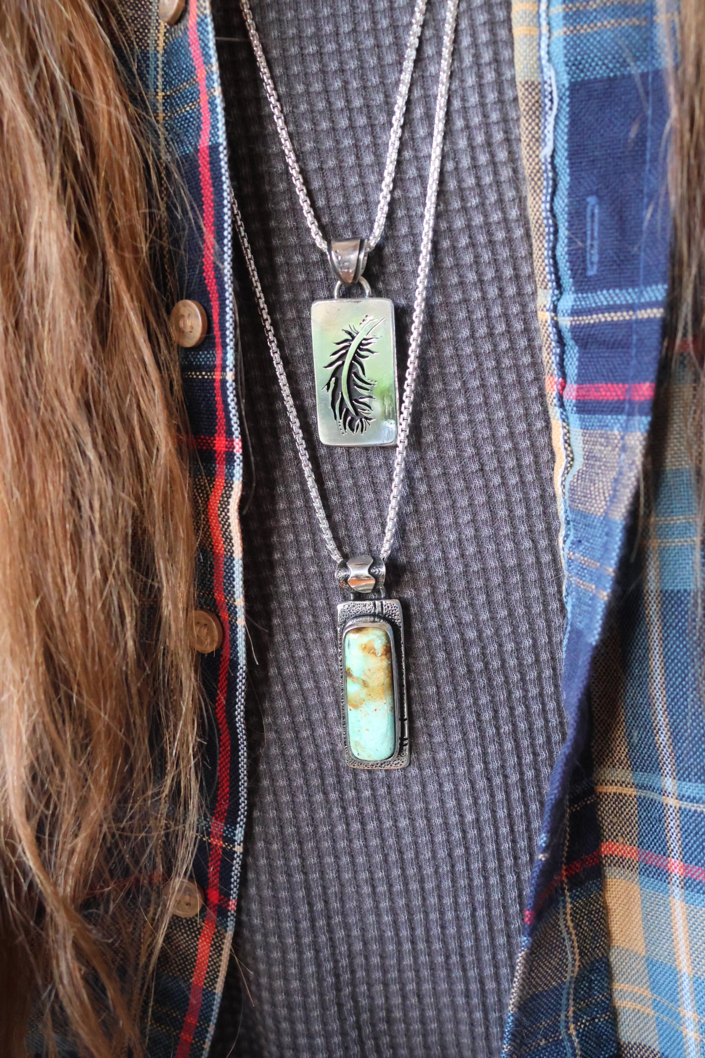 Sterling silver feather pendant