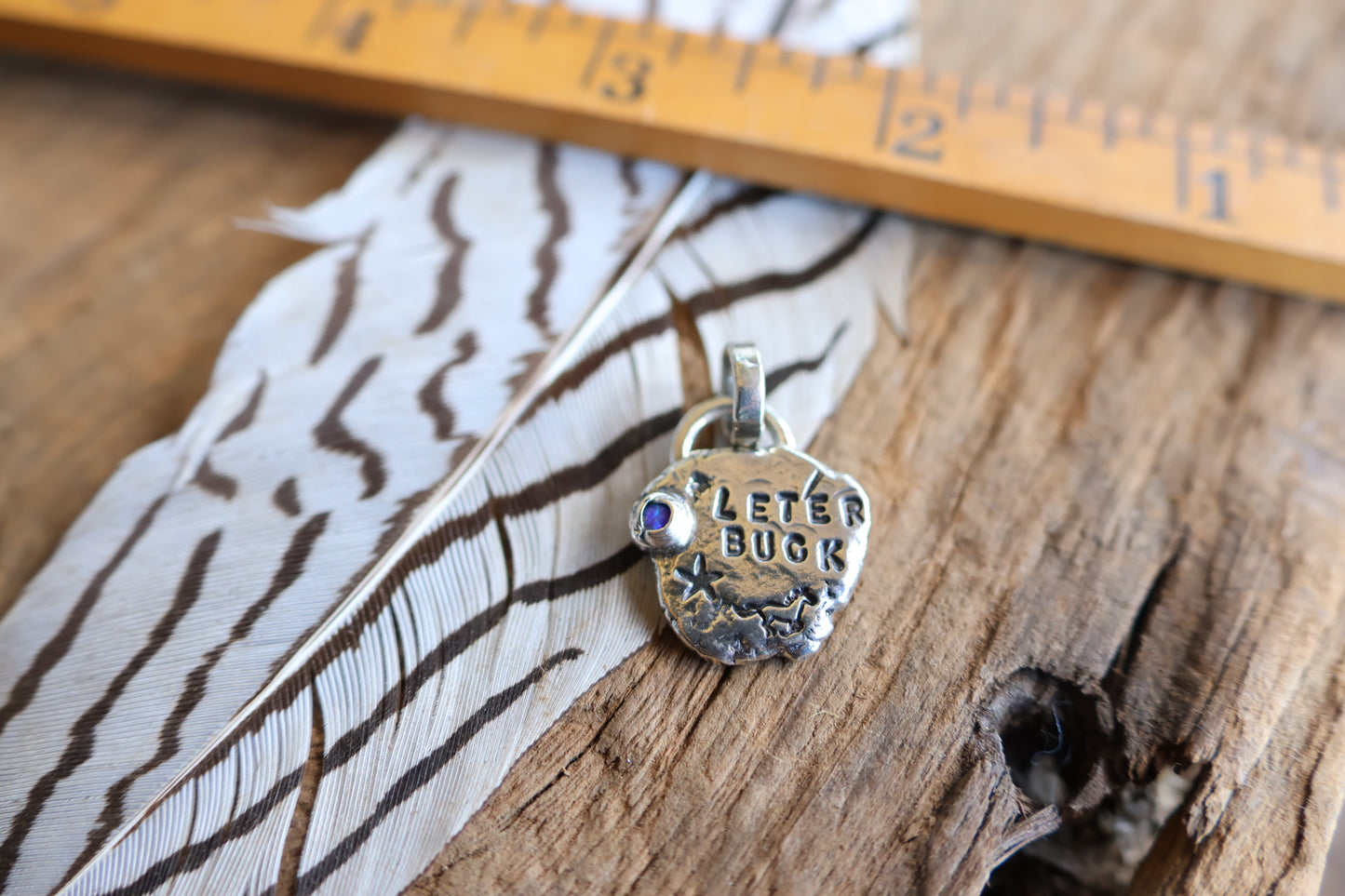 Let’er buck charm sterling silver with opal doublet