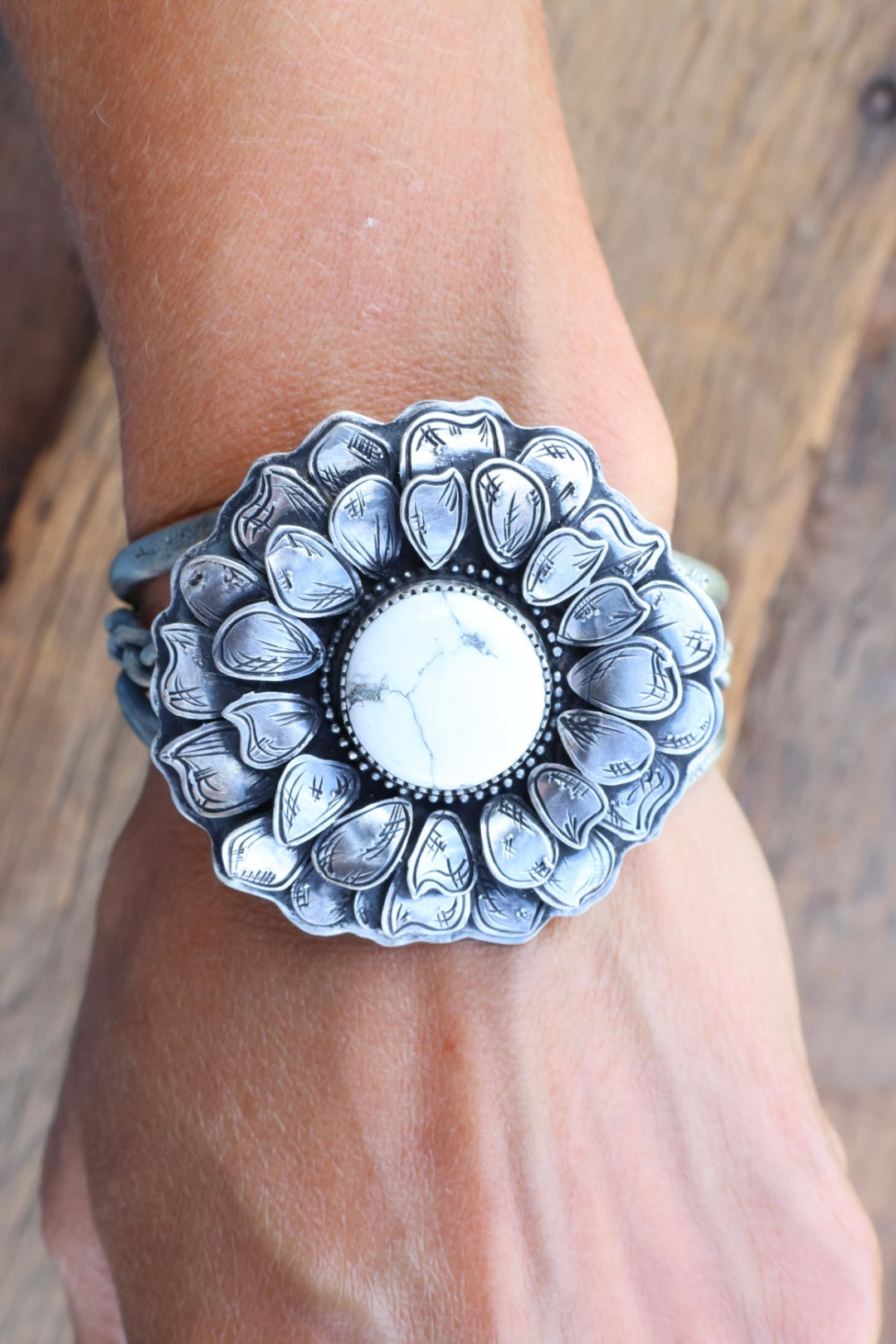 White buffalo flower engraved cuff