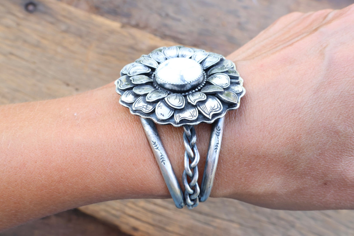 White buffalo flower engraved cuff