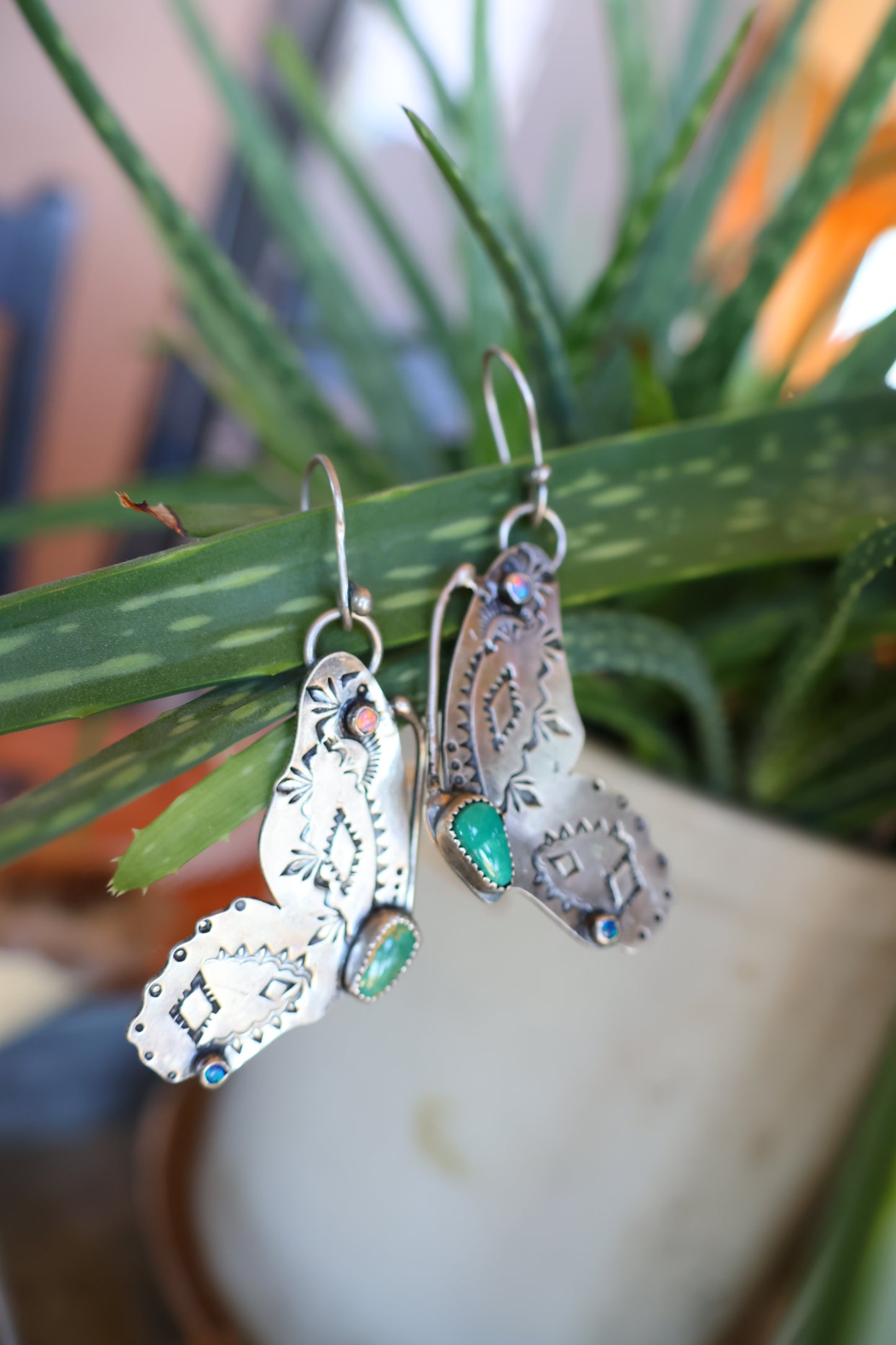 Butterfly dangly earrings