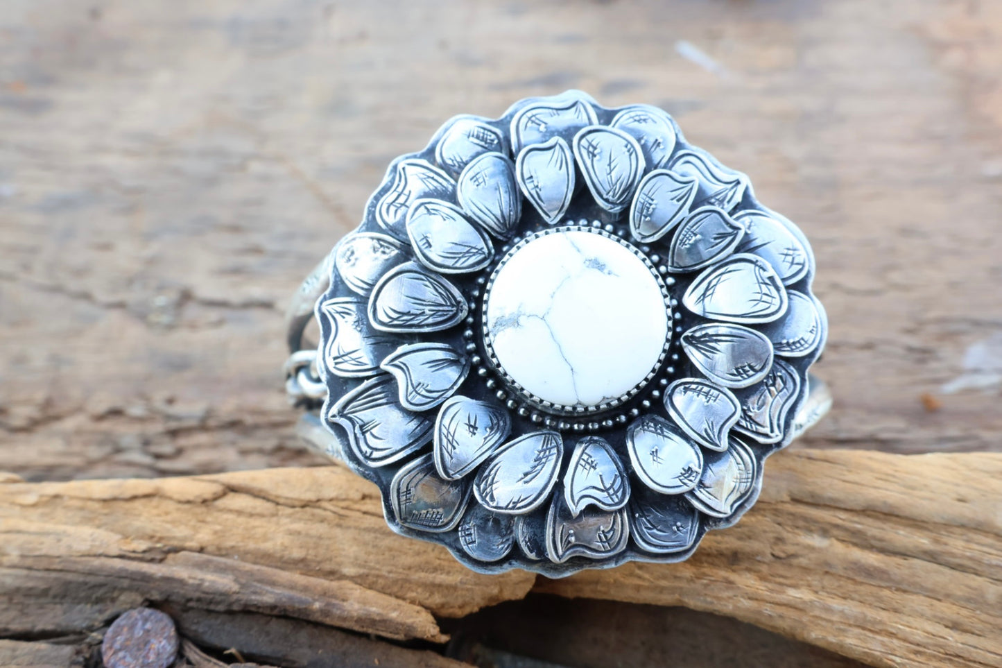 White buffalo flower engraved cuff